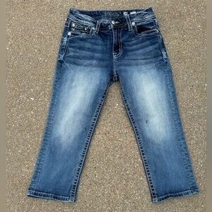 Miss Me Mid-Rise Easy Crop Sz 29 few holes as marked.